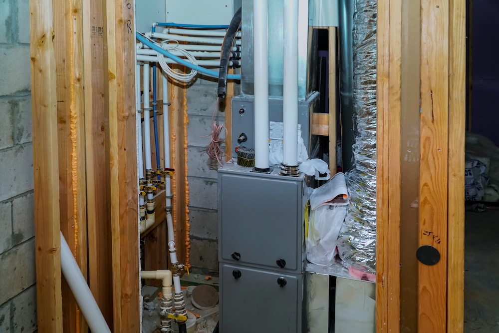 Installation of heating system home construction with roof of the pipe system of heating close up